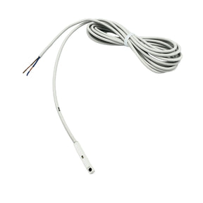 A white slide switch with an attached electrical cable and a connector.