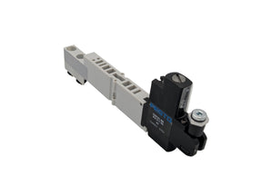 A slide regulator with a white body, black and gray details, on a white background.